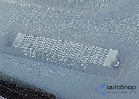 2000 Chevrolet Tracker из США, поврежденный, VIN 2CNBJ1863Y6920157